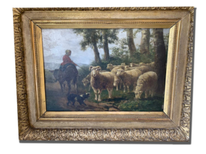 Tableau encadré scène pastorale : berger sur une monture avec troupeau de moutons près d’arbres, chien au premier plan