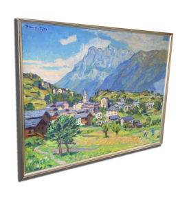 Tableau encadré : village au pied des montagnes avec clocher, maisons et champs verts sous un ciel bleu