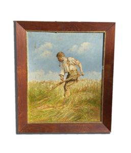 Tableau encadré : paysan fauchant un champ avec une faux, sous un ciel bleu avec nuages