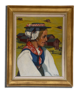 Tableau encadré : portrait de femme de profil en costume traditionnel suisse, foulard rouge et coiffe, paysage rural en arrière-plan