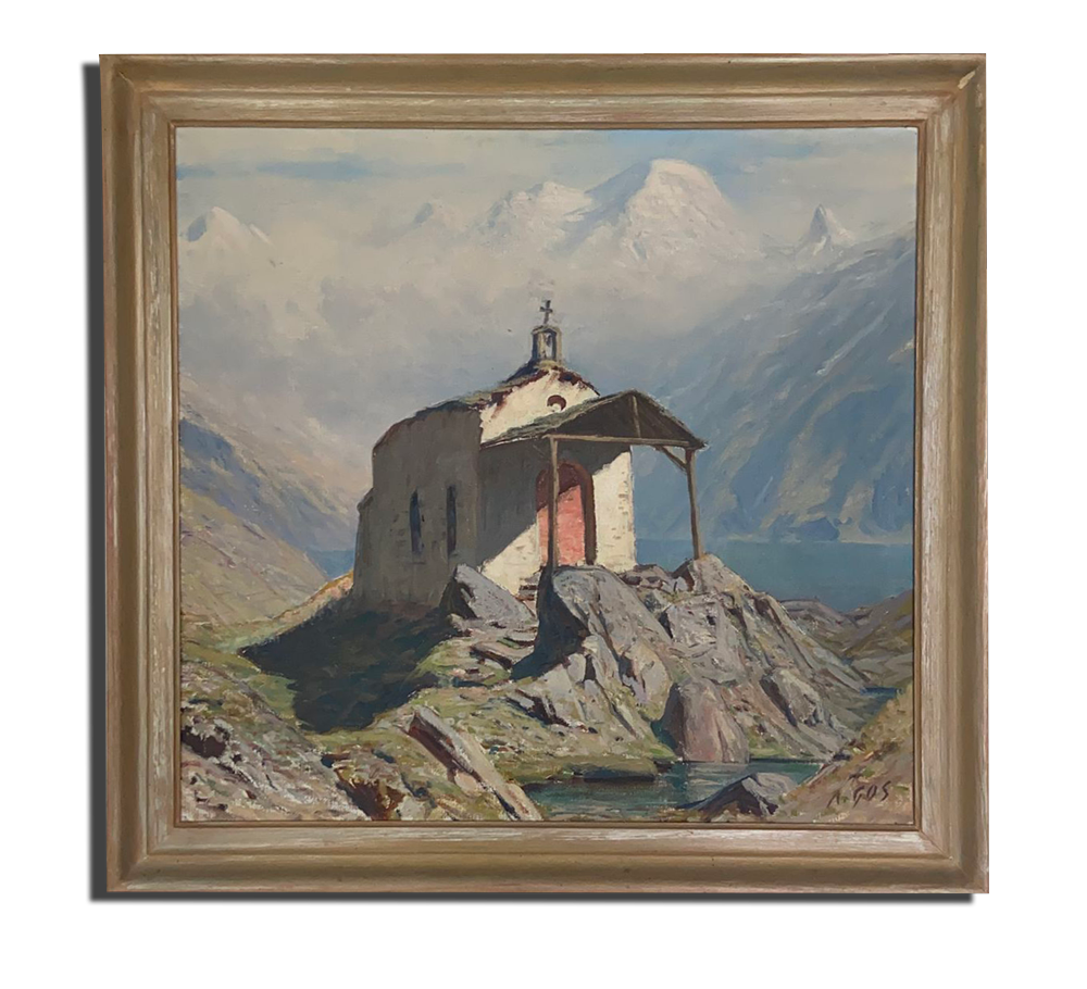 Tableau de paysage de montagne avec petite chapelle sur rochers au bord d’un lac, sommets enneigés au fond.