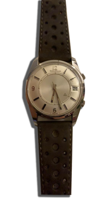 Montre vintage acier cadran argenté
