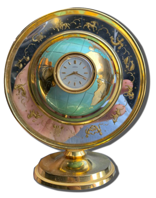 Pendule globe vintage dorée