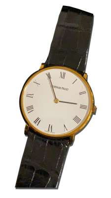 Montre vintage dorée chiffres romains
