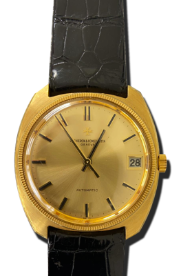 Montre vintage de luxe en or, cadran champagne et bracelet cuir noir