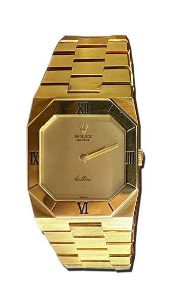 Montre vintage de luxe tout or avec bracelet métal intégré, boîtier octogonal et lunette à chiffres romains, cadran doré satiné