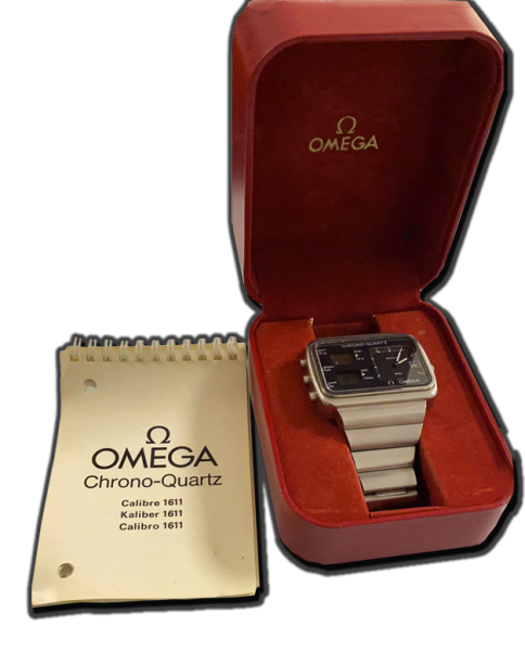 Montre de collection vintage suisse type chrono-quartz, boîtier rectangulaire, bracelet métal, présentée en écrin rouge avec livret calibre 1611 – Antiquaire Valais Suisse,